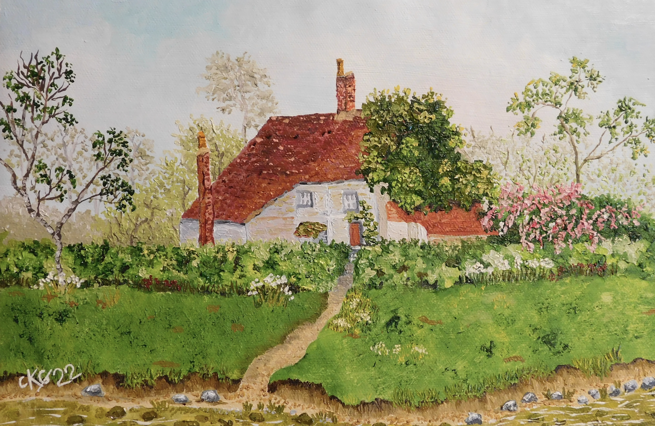 Country Cottage with river. An oil painting on A4 unstretched canvas